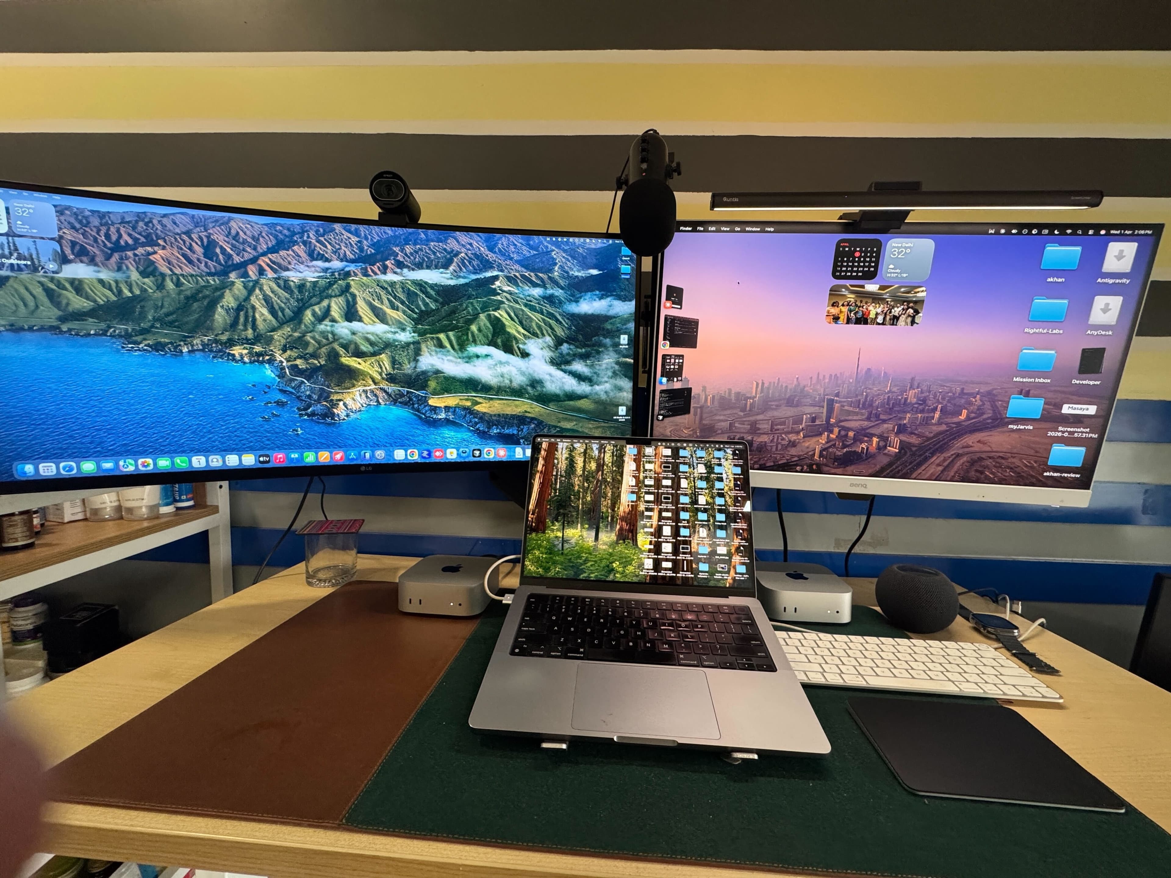 Arif Khan's desk setup — three Mac Minis, dual monitors, and a multi-agent workflow command centre
